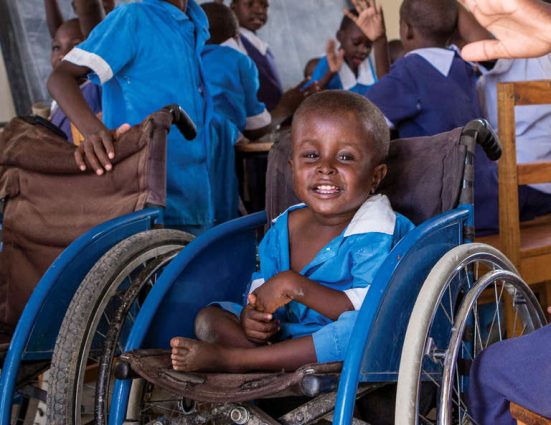 A classroom visit at St. John Paul II Home for Physical Impairment in Lokichar, Kenya. Save the Children partners with the center, to support outreach activities, identify children with disabilities and spread awareness and acceptance in their communities. Save the Children also pays for adaptive items that can help them lead normal lives such as prosthetic limbs, walking aids and specialized shoes. Photo credit: Jonathan Hyams/Save the Children, June 2016.